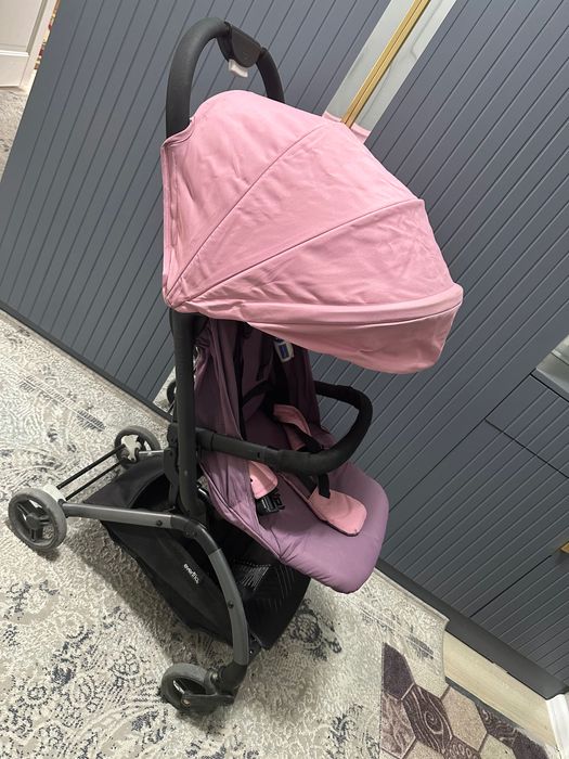 Детская коляска фирма Evenflo