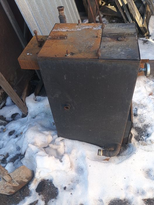 Продам котел на твердом топливе