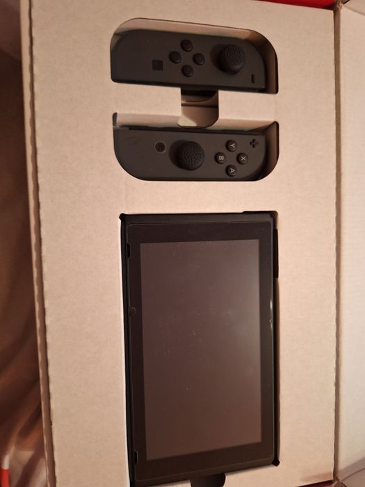 nintendo switch ca nou, fara zgarieturi, tot original, gata de joaca
