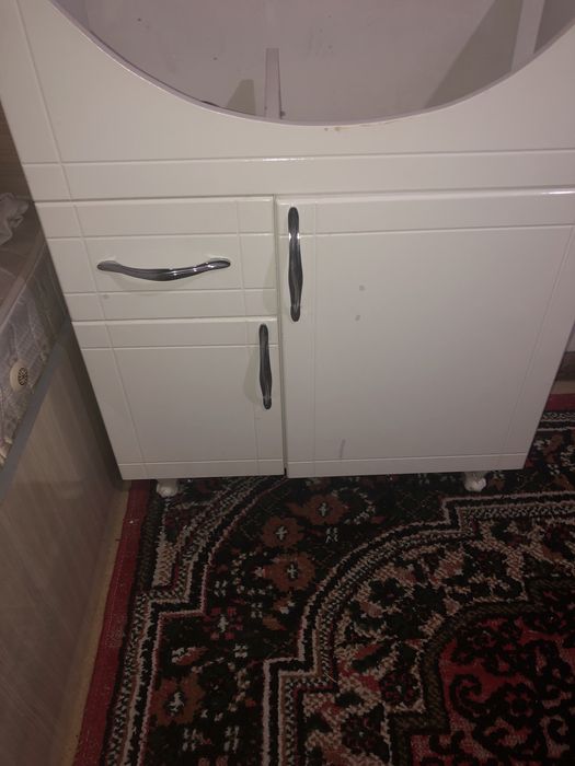 rakvinani tegida turadigan shkaf