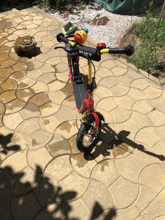 Trotineta copil , robusta ,folosita putin timp , roti gonflabile