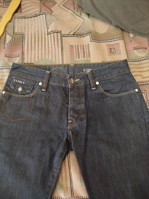 Фирменные джинсы