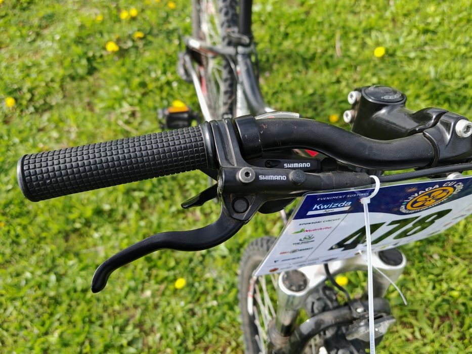 Bicicletă MTB 24", cadru aluminiu, frâne hidraulice pe disc