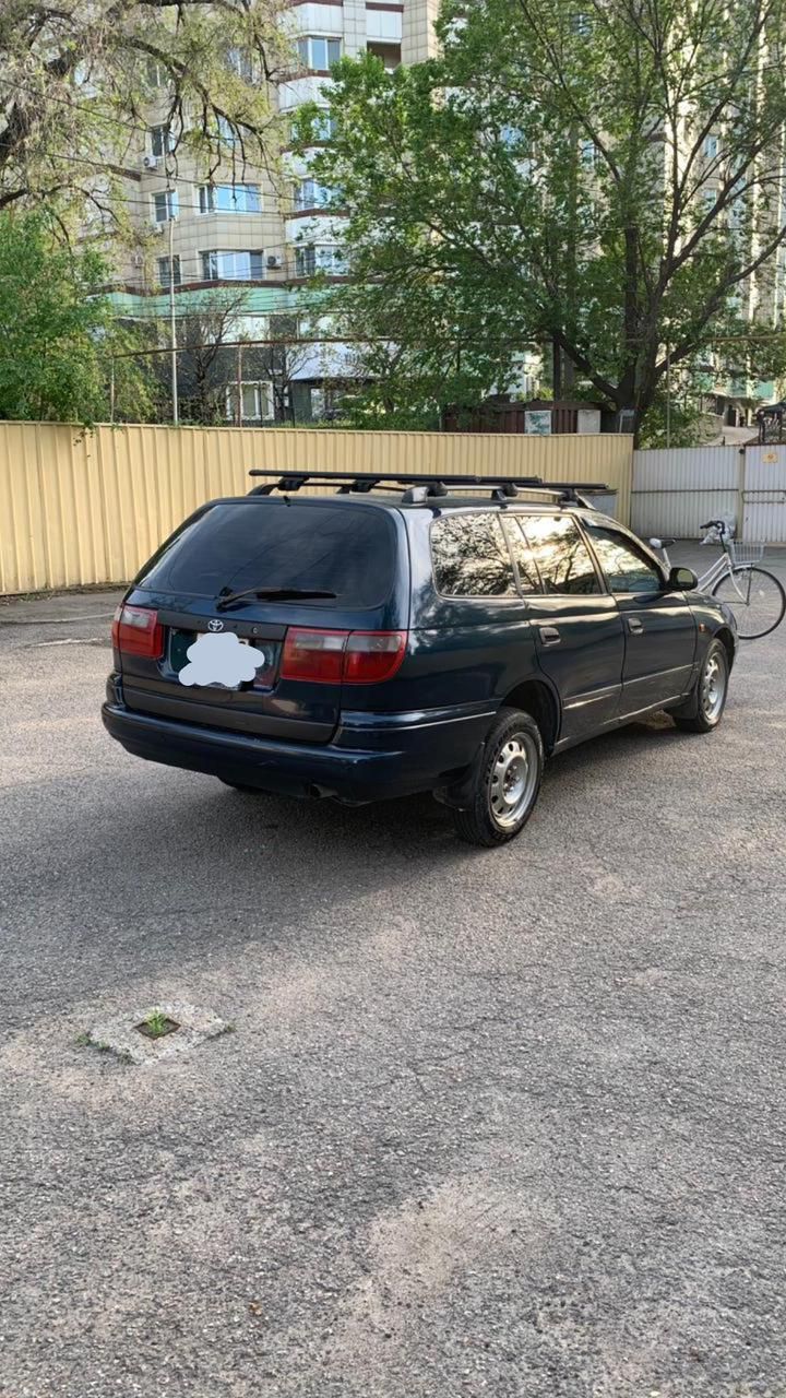 Toyota Carina E  1994 г. в объем  2куб торг будет с капотам