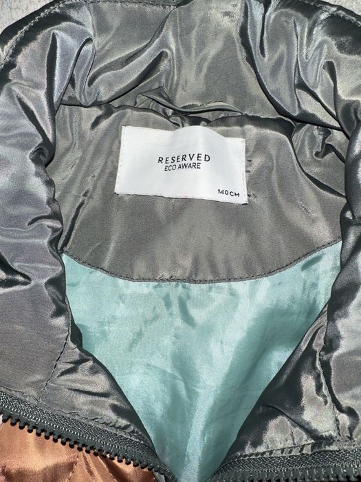 Geaca lunga matlasata marimea 10-11 ani (140 cm) Reserved