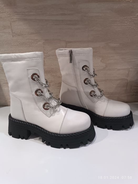 Продам  новые кожаные ботинки .