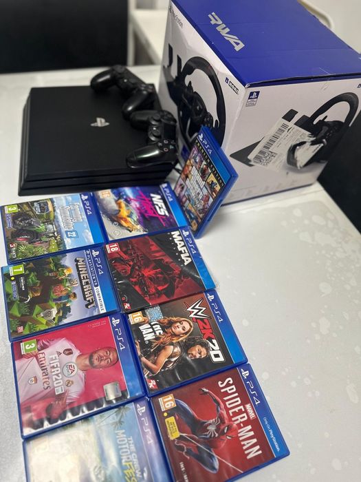 Vand Ps4 1TB cu9 jocuri volan si pedale