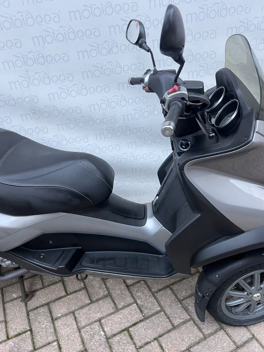 Motoideea vinde PIAGGIO MP3 300  2009 Rate