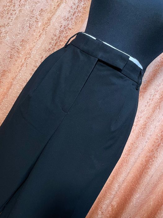 Pantaloni eleganți evazați