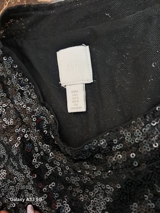 Seta dama pantaloni de piele și top cu paiete