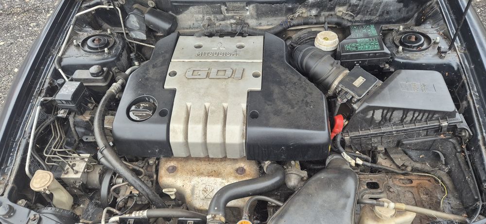 Мицубиши каризма 1.8 GDI