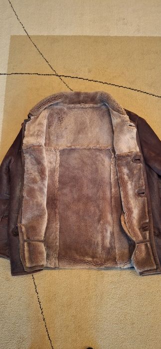 Haine și cojoc piele