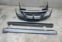 Vând bară față - spate - praguri OEM  pentru BMW E60 Facelift