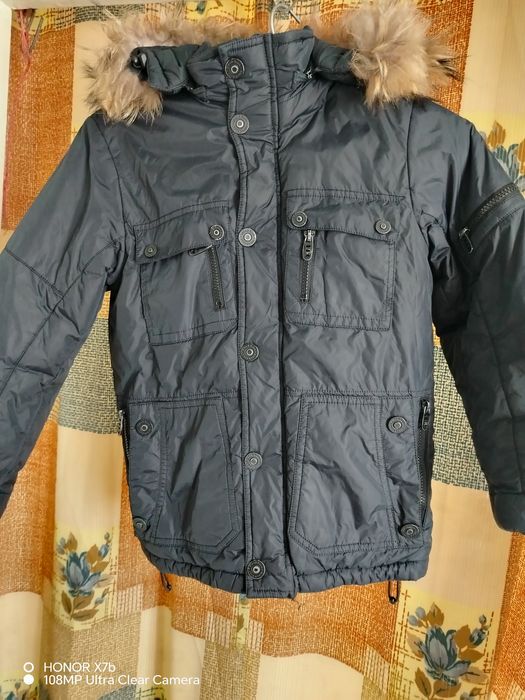 Продам куртку черного цвета на мальчика