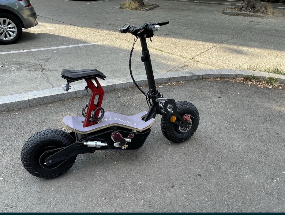 Scuter electric/veloficero