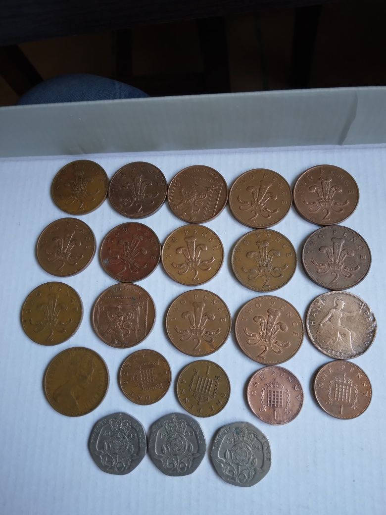 Lot monede cu Regina Elisabeta vânzare pentru colecționari pasionați