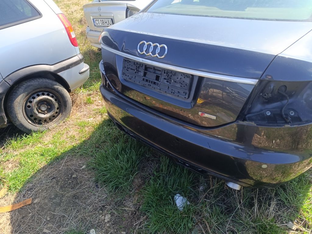 Bara spate Audi A6 C6 berlina evacuare dubla