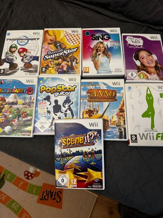 Wii impecabil cu jocuri și accesorii