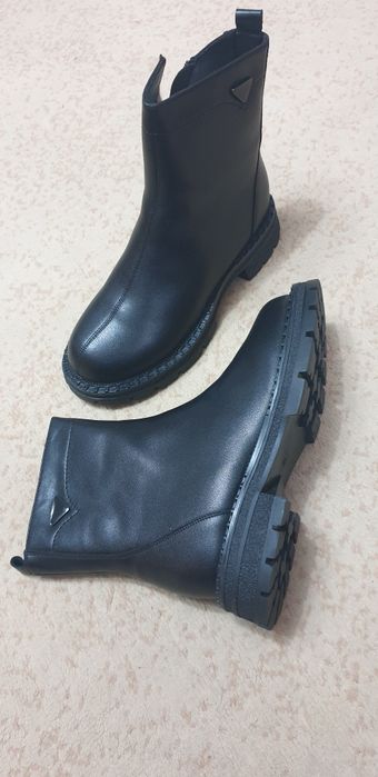 Продам зимние ботинки