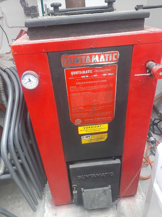 Vând centrală termica pe lemne  și pufar complet  funcțională.