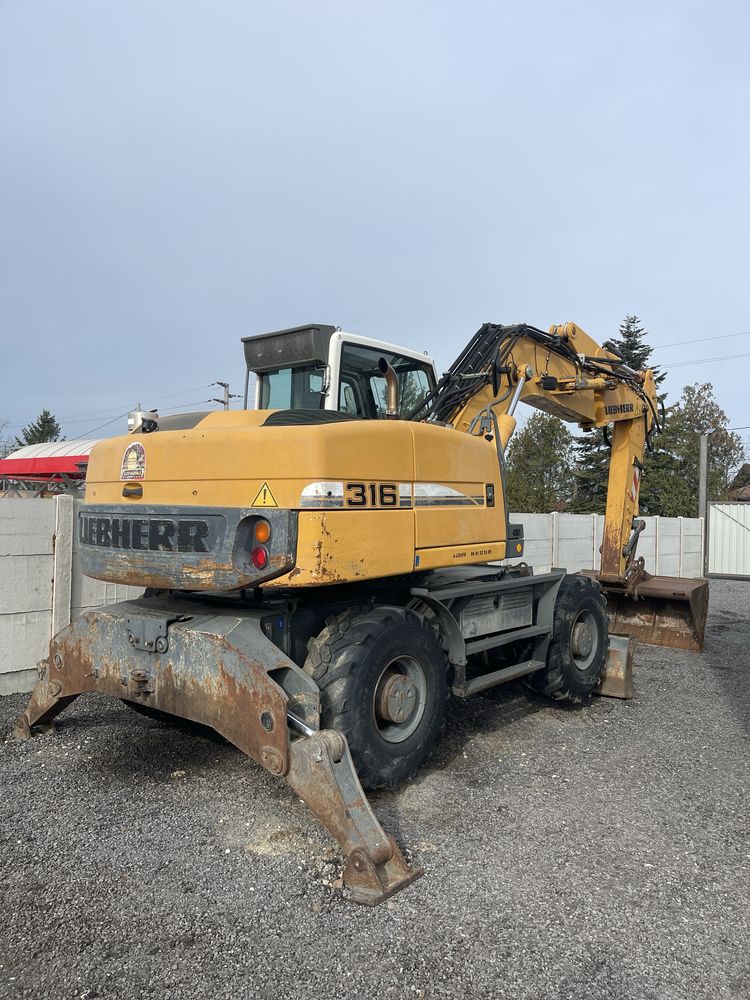 Inchirere Excavator pe pneuri Liebherr A 316