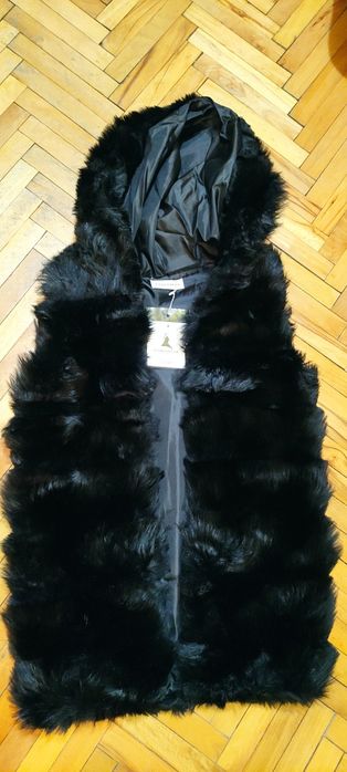 Дамски пухен елек с качулка