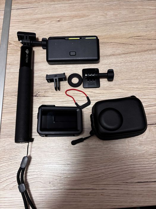DJI Osmo Action 4  Adventure Combo  Stare impecabila