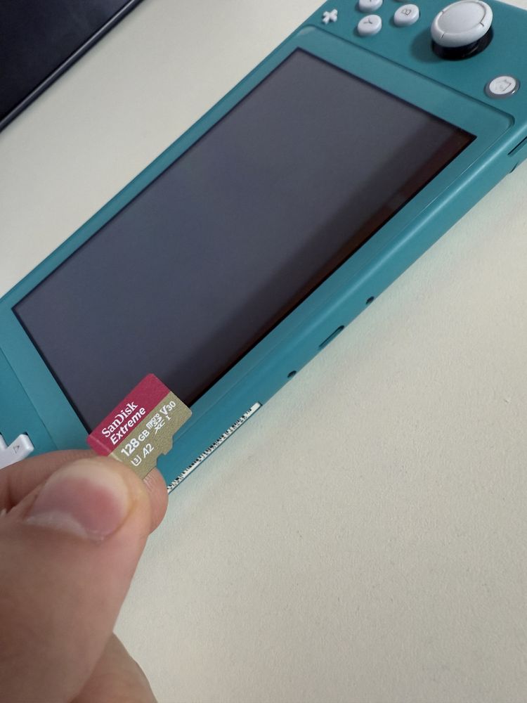 Nintendo Switch lite, turcoaz, functioneaza impecabil + husa + folie