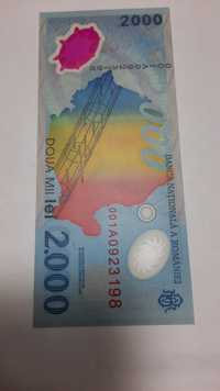 Bancnota 2000 lei cu polimeri cu eclipsa de soare din 1999 seria 001A
