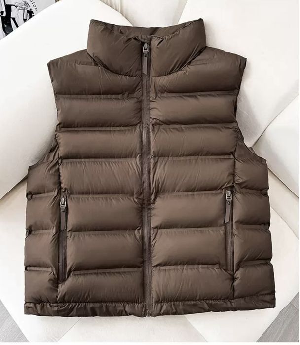 Жилетки женские новые