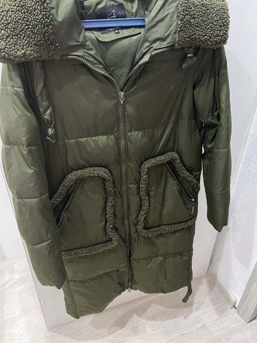 Продам пуховик теплый