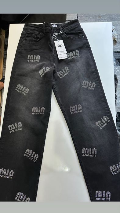 Blugi Miu Miu evazati, disponibil toate marimile