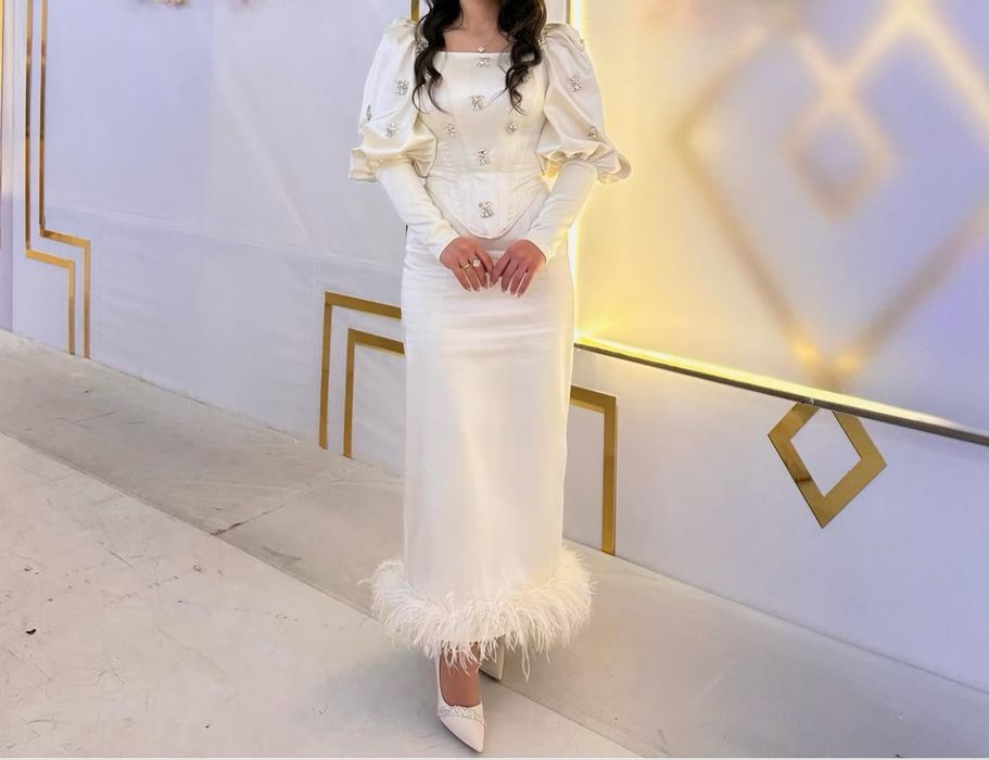 Шикарный костюм айвори турция  42 размер