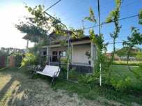 Casa de vanzare cu etaj complet mobilata, cu gradina  + 5000 mp padure