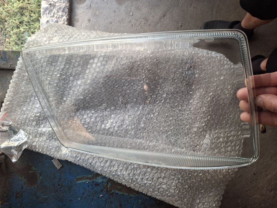 Стекло фары на МАN TGX оригинал