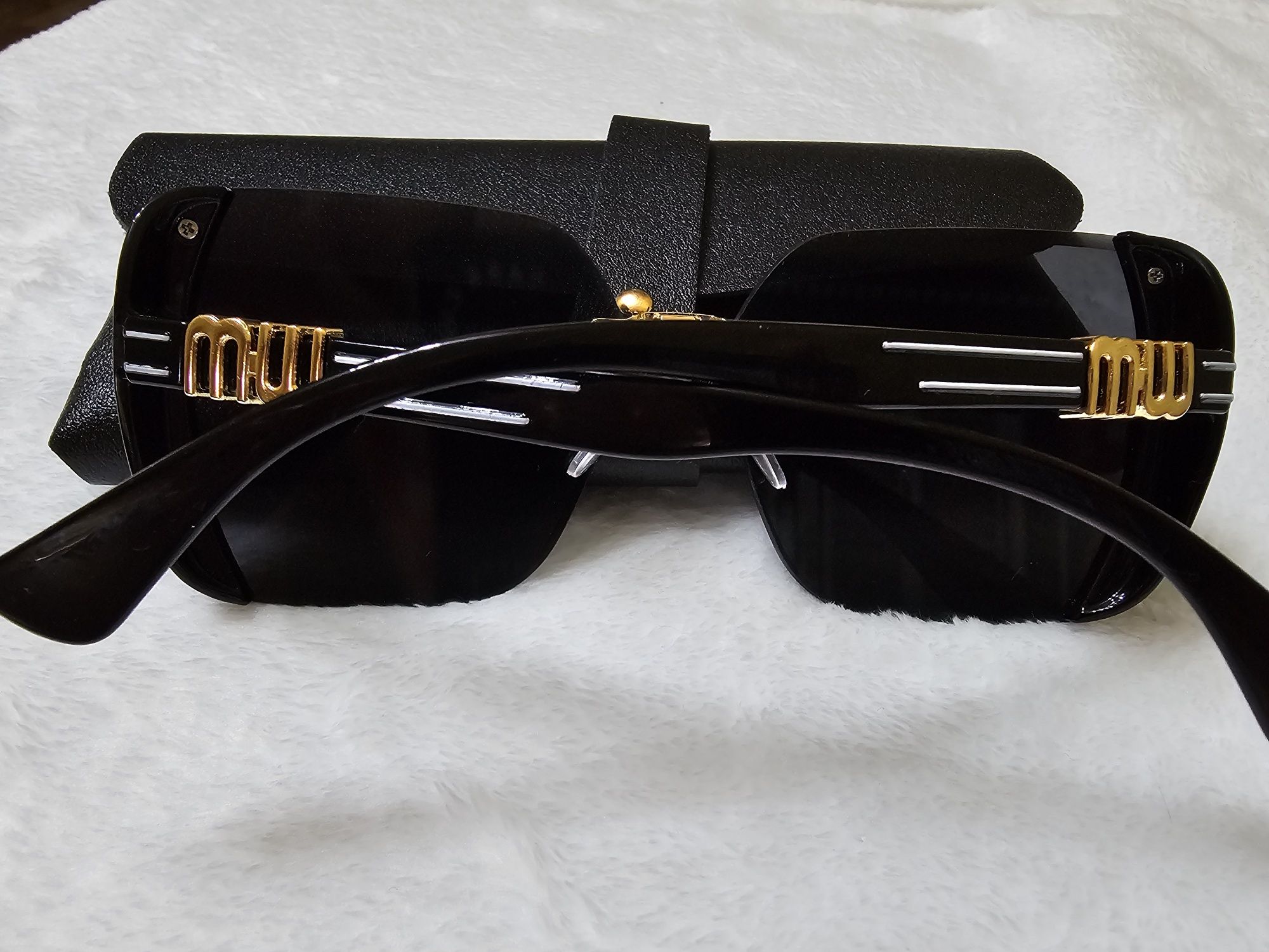 Солнцезащитные очки  Miu Miu (Миу Миу) с блестками.