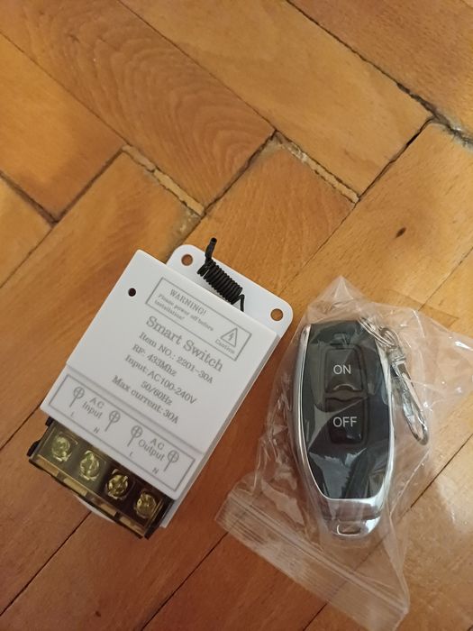 1. Switch 433Mhz, 30A, 110-240V cu telecomnada