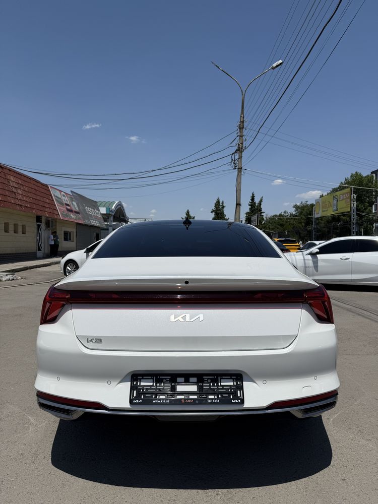 Kia K8 Full sotiladi holati idyal rangi beliy murojat uchun telfonqiln