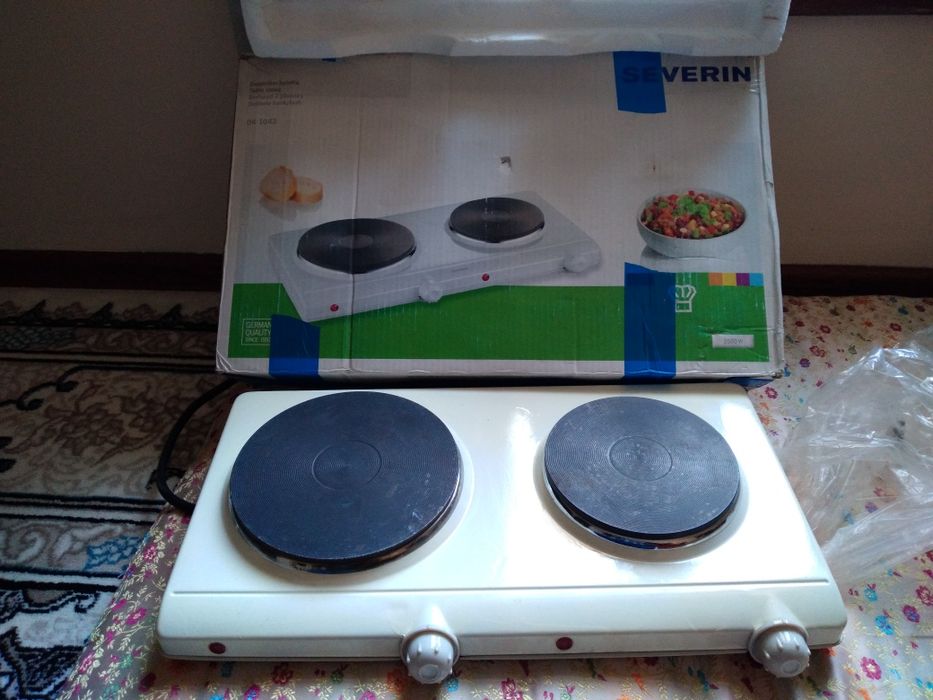 Электрическая двухкомфорная плита.