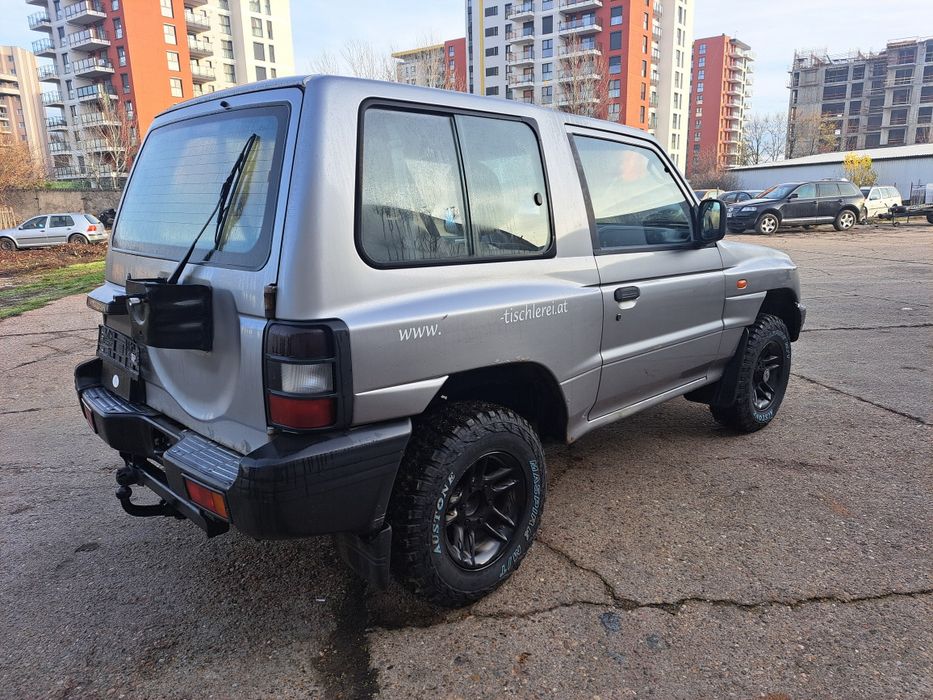 Mitshubishi pajero 2.5 an 2004 clima
