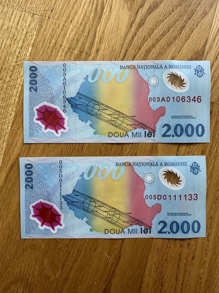 Bancnota 2000 lei eclipsa seria A si D