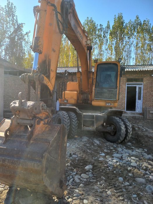 Экскаватор Hyundai  1400 w 7