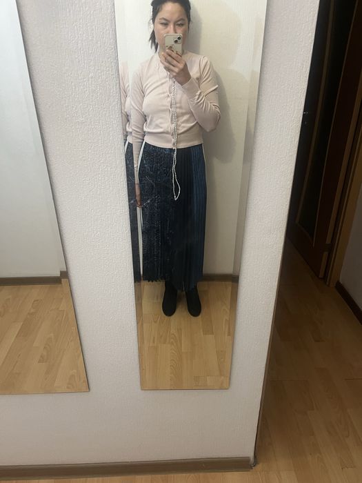 Юбка длини миди