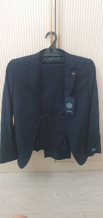 Мужской костюм с брюками тройка