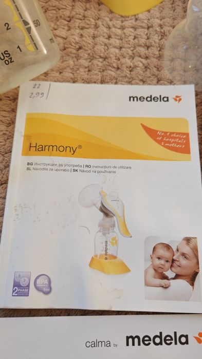 Ръчна помп за кърма Medela Harmoni с биберони Calma и подаръци