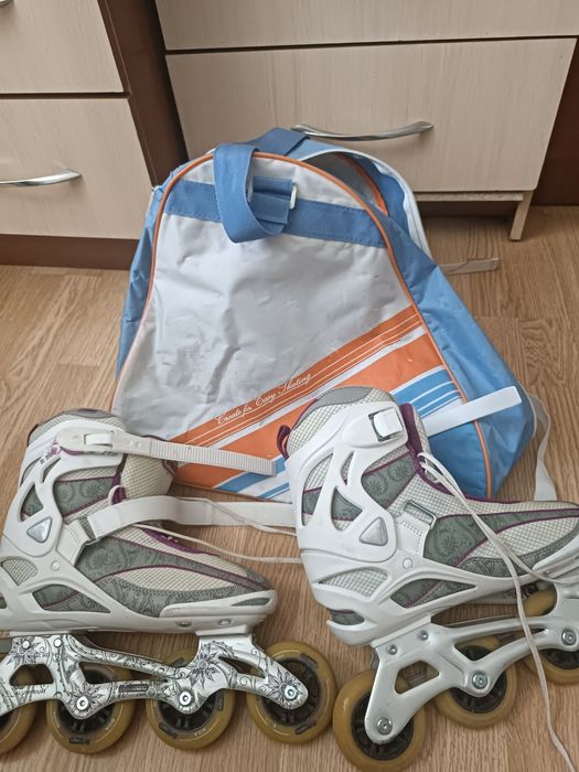 Роликовые коньки