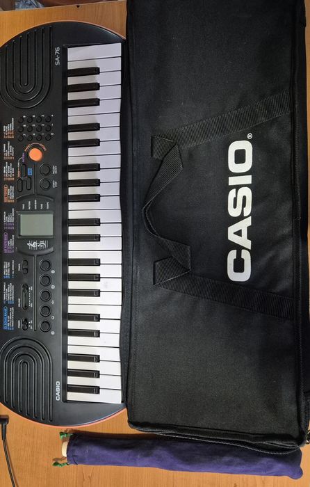 Vand orga Casio + flaut fiecare vine cu husa