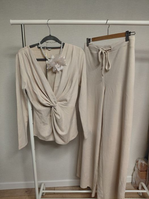 Продам костюм L размер новый