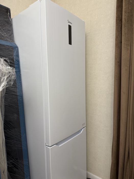 Новый холодильник Midea