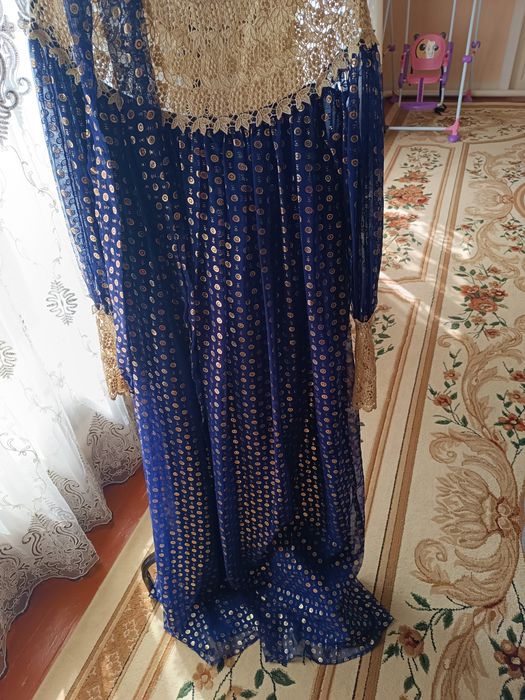 Homilador ayollar uchun koʻylak